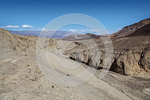 Dry riverbed near ArtistÃ¢â¬â¢s Palette in Death Valley National Park photo